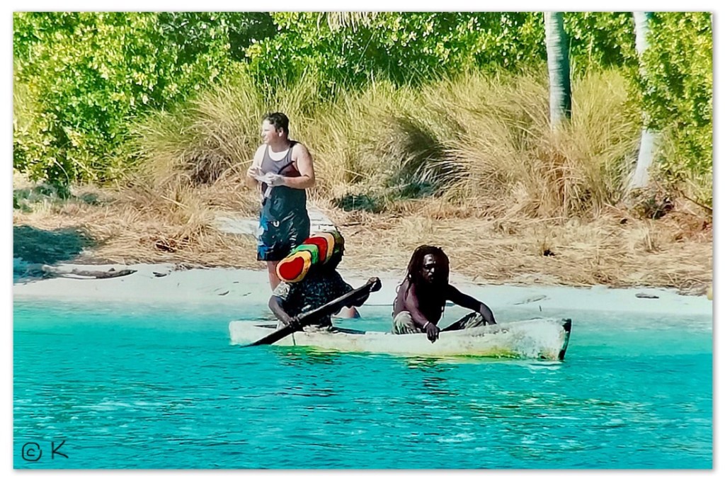 Locals in a boat /Swimming with sharks and a stingray that purrs @ Kirsten K Kester | InsightandVisions.com