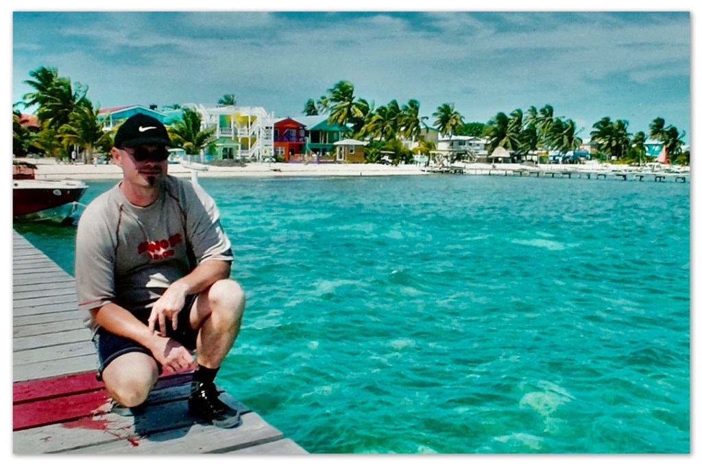 Man at pier /Swimming with sharks and a stingray that purrs @ Kirsten K Kester | InsightandVisions.com